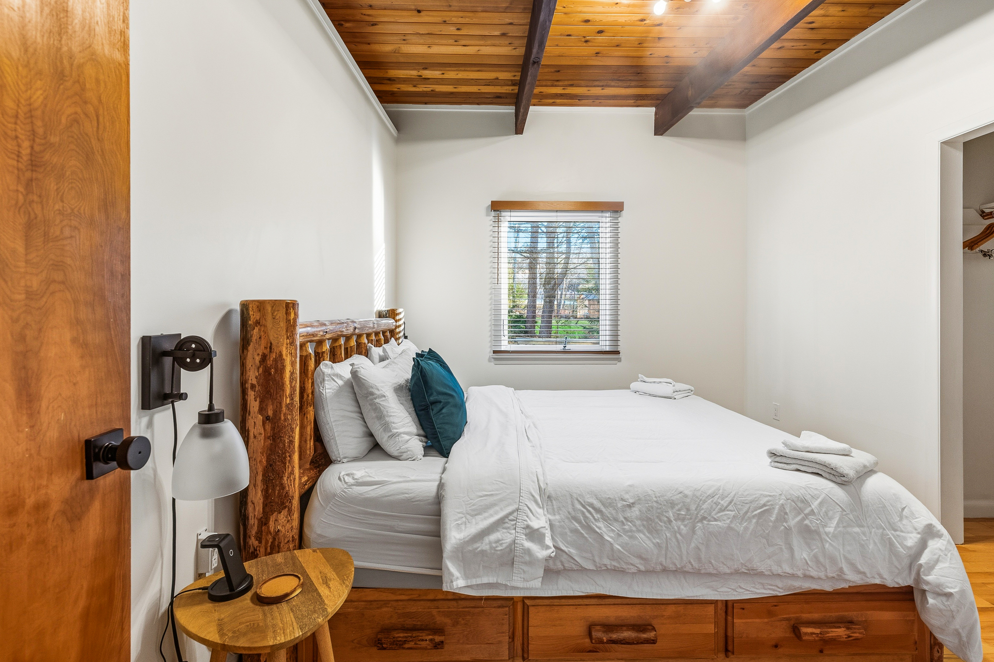 Bedroom 1 — King bed detail