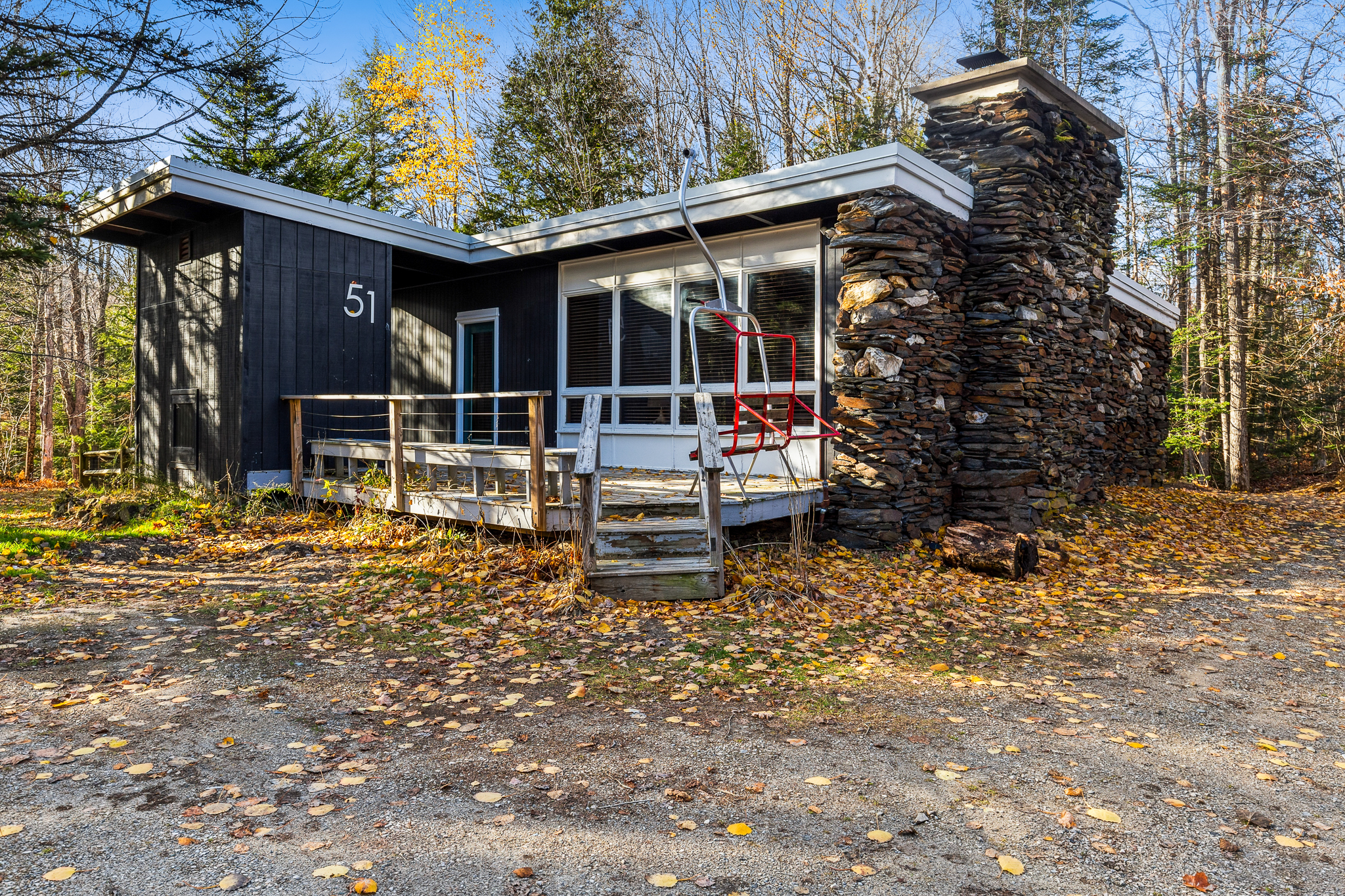 Kilbourne Lodge — navy mid-century exterior