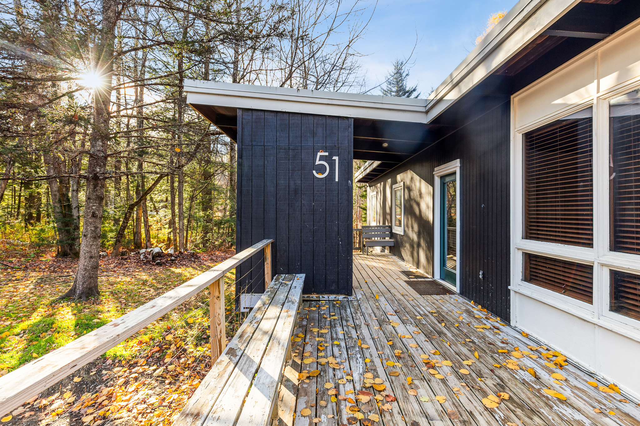 Lodge exterior with sunburst light